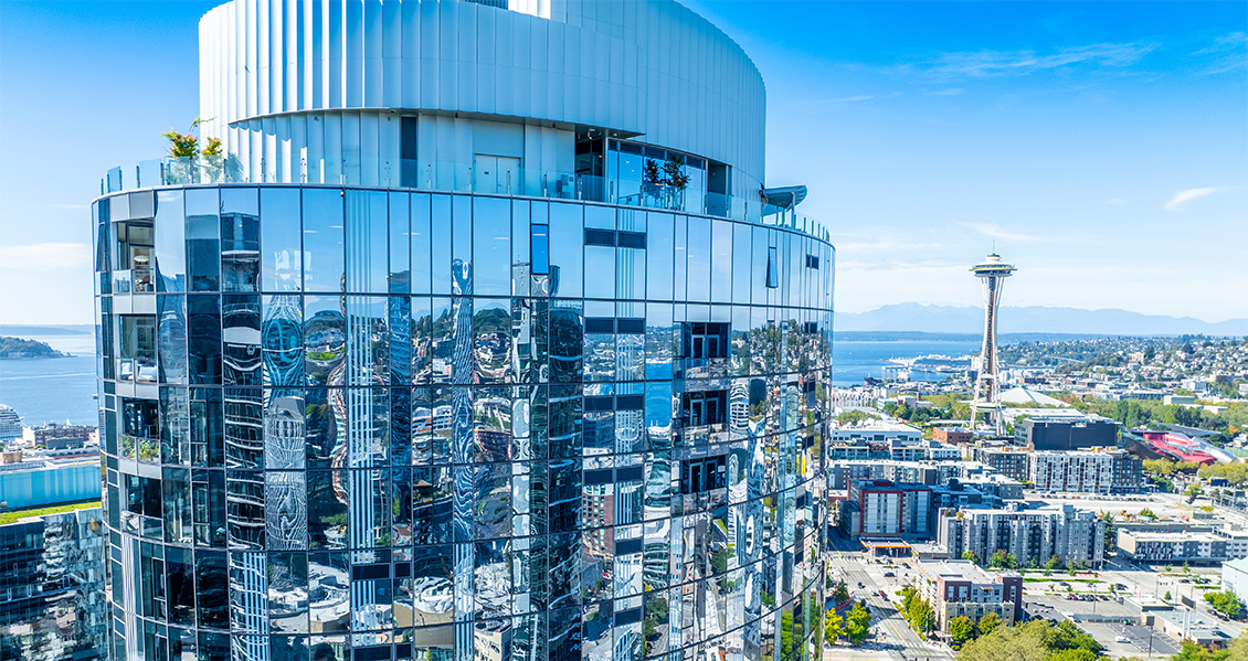 Aerial view of the McKenzie rooftop lounge with the Space Needle in the background.