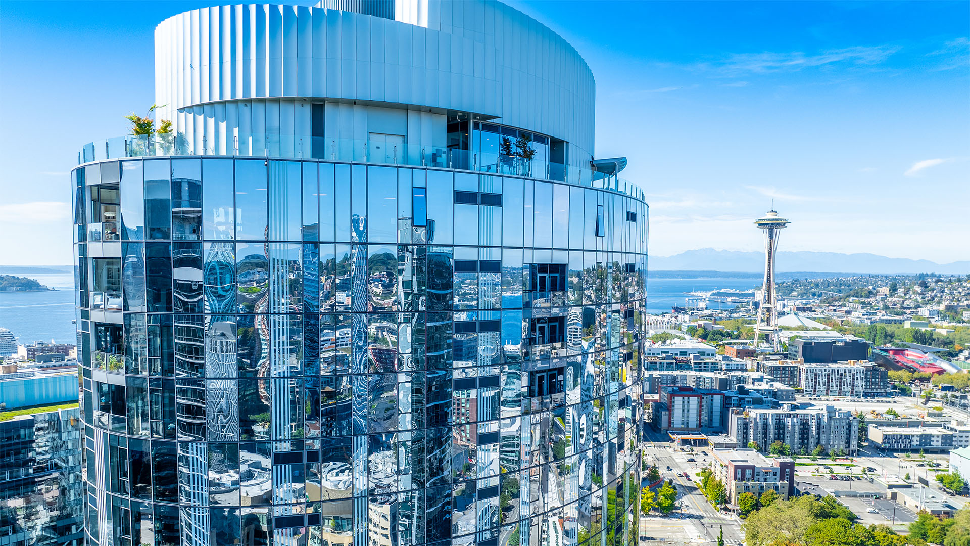 Aerial view of the McKenzie rooftop lounge with the Space Needle in the background.