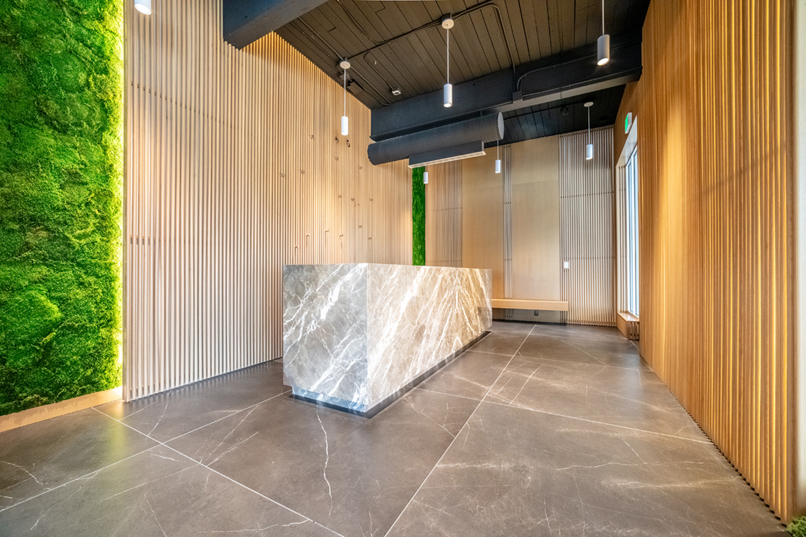 2230 Eight interior with stone floors and green wall.