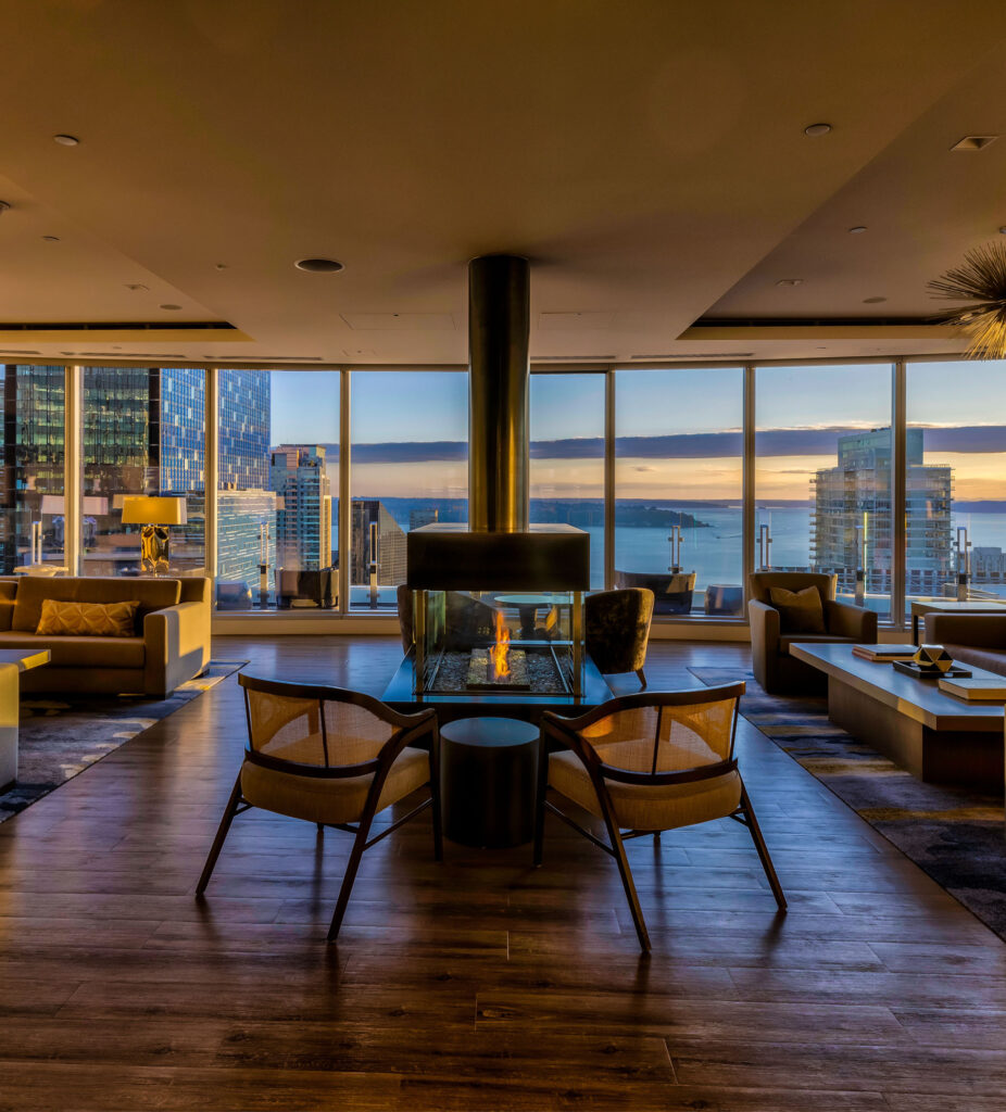 Luxurious interior amenity space on upper floor of tall building in downtown Seattle.